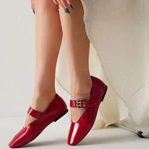 Woman's sleek, red Mary Jane round toe silver buckle flats size 9